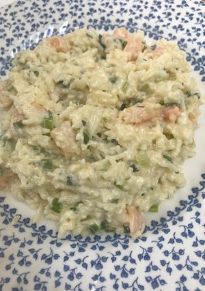 A picture of Creamy spring onion prawns with parsley rice.