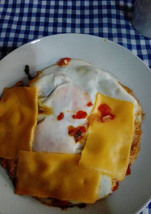 Una foto de Huevos estrellados con acelga