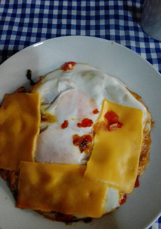 Una foto de Huevos estrellados con acelga