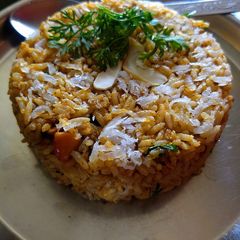A picture of Leftover rice puliyogare.