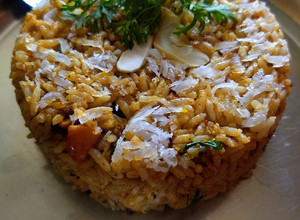 A picture of Leftover rice puliyogare.