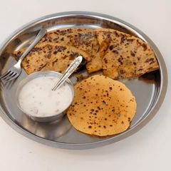 A picture of Aloo onion butter paratha.