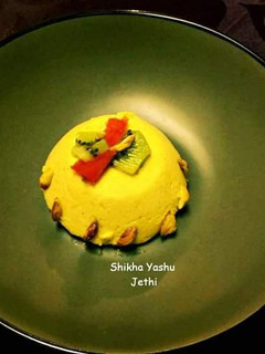 A picture of Saffron Pistachio Panna Cotta.