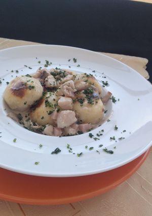 Una foto de Ñoquis rellenos con muzzarella