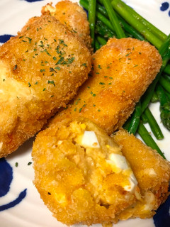 A picture of Orange Lentils and Egg Croquette.