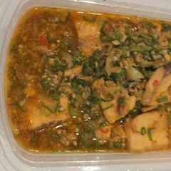 A picture of Okro soup with chicken.