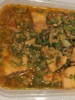 A picture of Okro soup with chicken.