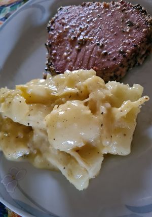 A picture of Seared Tuna Medallions with Yuca in Mojo Sauce.