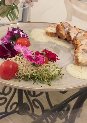 Una foto de Rollos de trucha relleno de verduras y champiñones