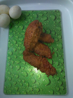 Una foto de Tiras de pollo empanadas