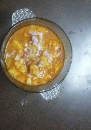 A picture of Potatoes and tomatoes sweetened sour vegetable.