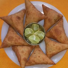 A picture of Vegetable Samosa from Spring Roll Wrapper.