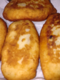 Una foto de Bombas de papa rellenas de carne fritas