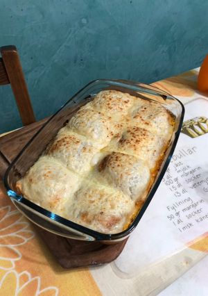 Una foto de Crepes de carne en tuco con salsa bechamel