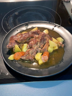 Una foto de Manitas de Cerdo guisadas