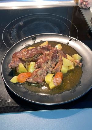 Una foto de Manitas de Cerdo guisadas
