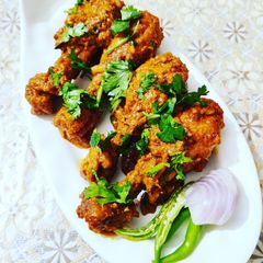A picture of Spicy Chicken Drumstick or Masala Tangdi.