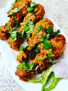 A picture of Spicy Chicken Drumstick or Masala Tangdi.