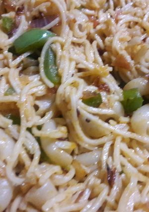 A picture of Macaroni chowmein with lots of veggies.