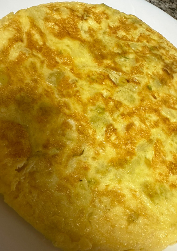 Una foto de Tortilla de patata rápida y con poco aceite