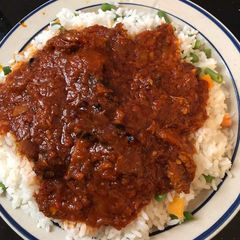 A picture of Yummy rice with stew.
