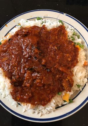 A picture of Yummy rice with stew.