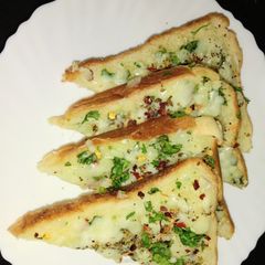 A picture of Cheese garlic bread.