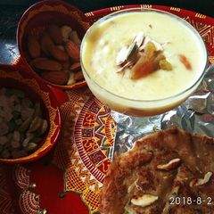 A picture of Kheer kesar and Malpua.