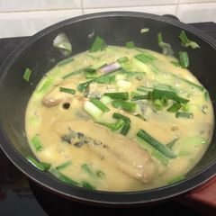 Herring Fillet In Mustard Sauce With Scallion A picture of Herring Fillet In Mustard Sauce With Scallion.