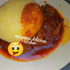 A picture of Eba and stew.