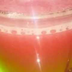 A picture of Carrot pomegranate juice.