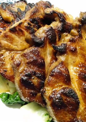 A picture of Cola marinated pork steaks.