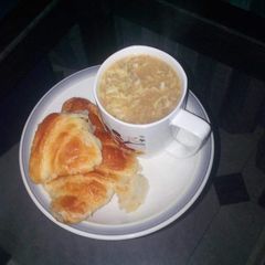 A picture of Soup With Bread.