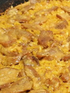 Una foto de Arroz con secreto y boletus
