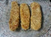 Una foto de zucchini milanesa