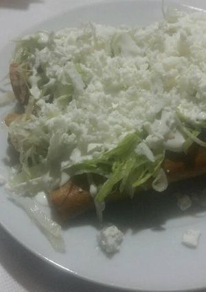 Una foto de Tacos dorados de papa