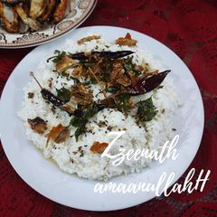 A picture of Grandma's Curd Rice with Curd Chillies.