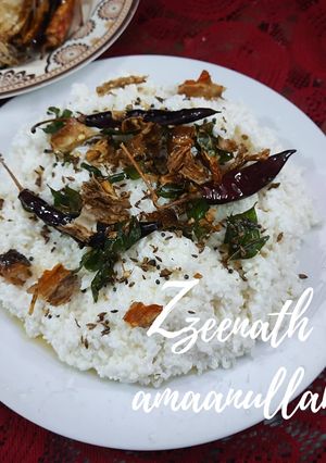 A picture of Grandma's Curd Rice with Curd Chillies.