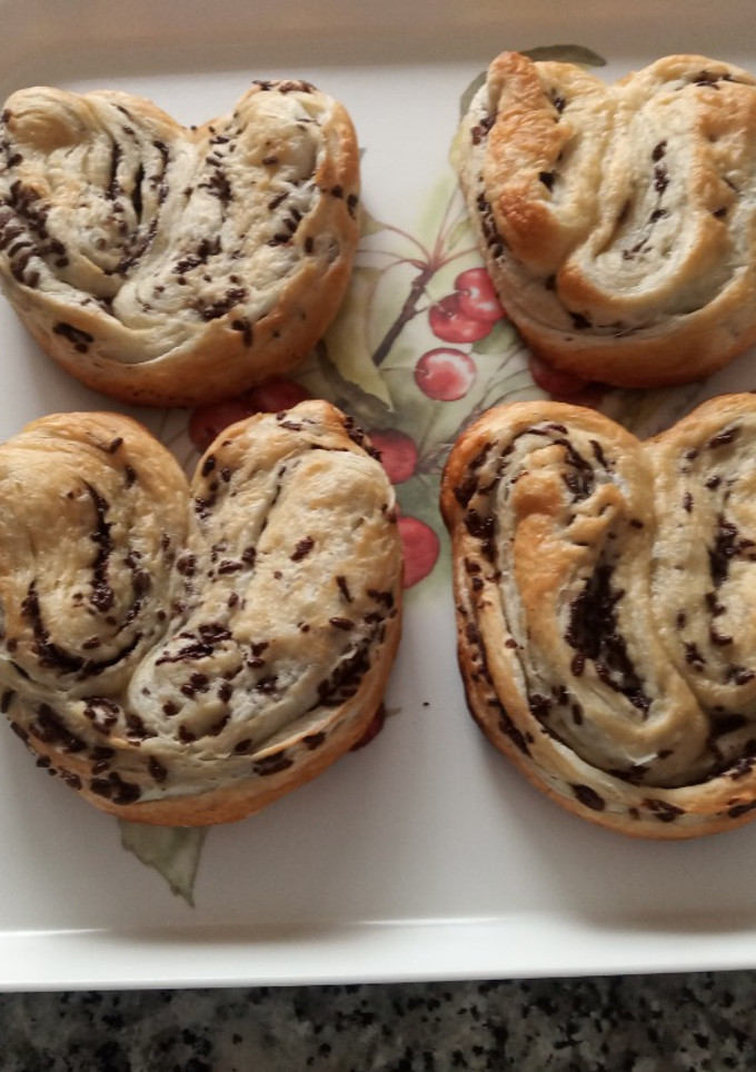 Una foto de Palmeras medianas de hojaldre con chocolate