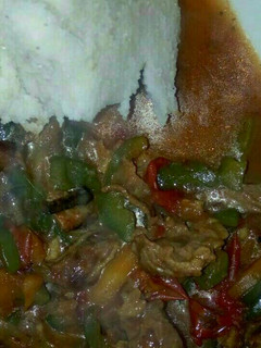 A picture of Beef Stew with Ugali.