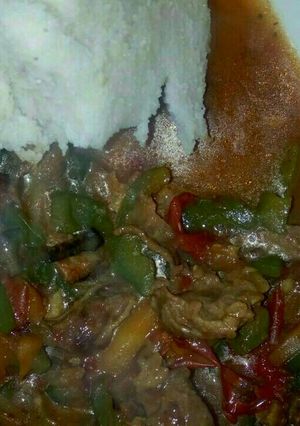 A picture of Beef Stew with Ugali.