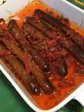 Merguez aux poivrons rouges, échalotes et herbes