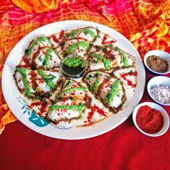 A picture of Gujia Dahi Badas.