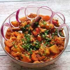 A picture of From Valley to Veggie Bowl: The Aromatic Magic of Mix Veg Rogan Josh.