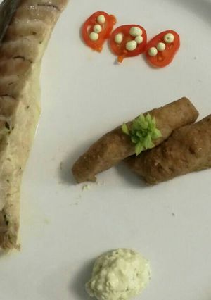 Una foto de Fogonero a baja temperatura con pella y perlas de albahaca