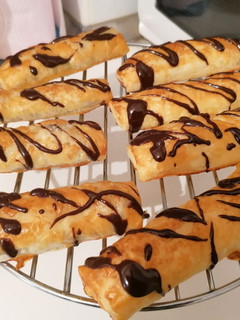 Una foto de Napolitanas de nocilla y crema pastelera
