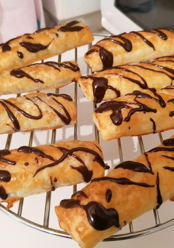 Una foto de Napolitanas de nocilla y crema pastelera