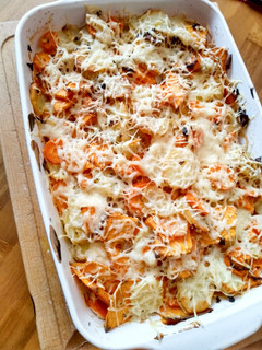 Une photo de Gratin pommes de terre, patate douce, carotte