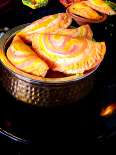 A picture of Rose Coconut karanji.