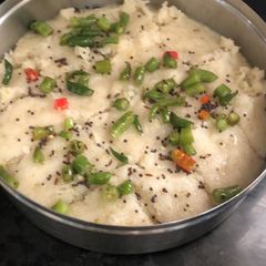 A picture of Suji Dhokla-white dhokla.